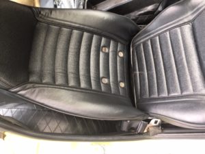 passenger reupholstered seat and belt